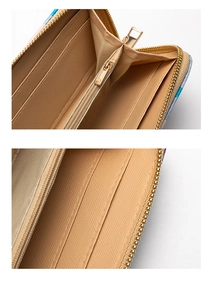 Macro detail of the interior beige cross-grain leather lining with multiple card slots