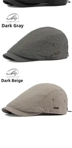Detail of breathable seersucker texture and plaid brim on casual beret ivy caps