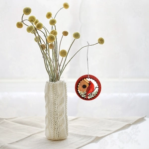Christmas tree hanging ornament with cardinal bird design and red glitter border detail