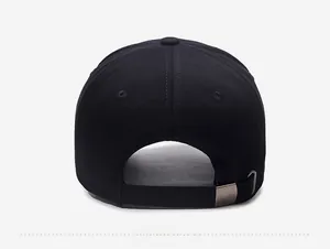 Detail view of back closure on vintage black cotton baseball cap with metal buckle