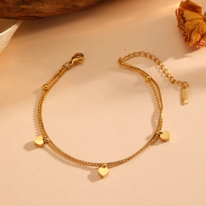 Double-layered 18K gold plated stainless steel bracelet with heart charms and beads