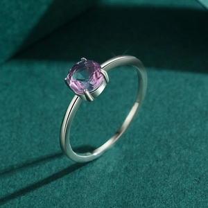 Elegant S925 sterling silver ring with round purple gemstone in four-prong setting