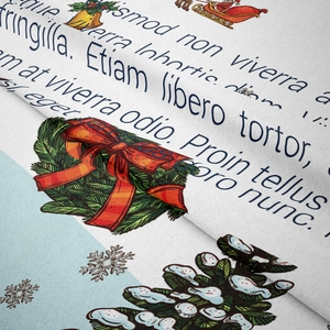 Close-up of bohemian Christmas tapestry showing printed pine trees and snowflakes