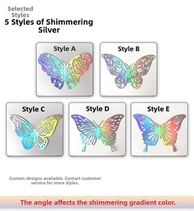 Detail of five 3D laser-cut butterfly wall stickers with holographic silver finish