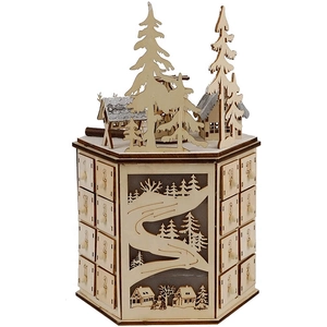 Detail of wooden advent calendar with 24 drawers and laser-cut forest scene decoration