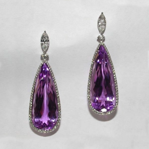 Élégantes boucles d'oreilles goutte en argent avec zircons violets et accents marquise