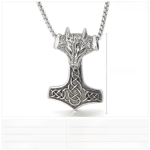 Detailed view of punk wolf head Mjolnir pendant in polished cast stainless steel