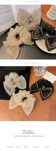 Detail of mesh bow scrunchies with rhinestones in black and beige lifestyle setting