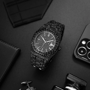Detailed view of black iced-out sport watch with octagonal bezel and crystal details