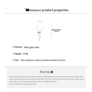 Detailed size chart of white lace bow necklace with colorful beads and floral pendants