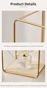 Close-up of golden iron frame with hand-welded joints and solid wood shelf detail