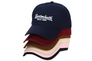 Detailed stack of six colorful baseball caps featuring vintage Dartmouth embroidery