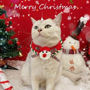 Handmade crochet Christmas cat collar with red and green knit pattern and white pompom