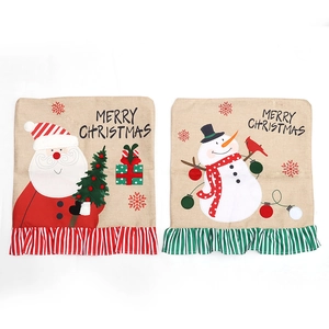 Christmas chair covers featuring Santa and Snowman motifs with red green striped ruffles