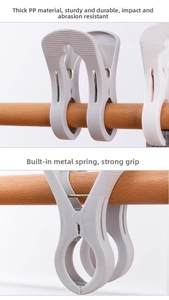 Detail of white heavy-duty quilt clip showing thick PP plastic and strong metal spring