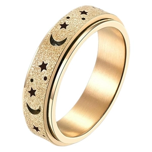 Gold stainless steel rotating ring with frosted finish and hollow star moon patterns