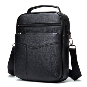 Vertical black lychee leather crossbody bag for men with top handle and shoulder strap