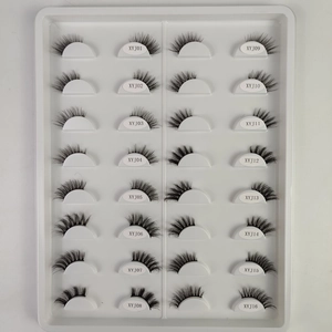 Detailed grid of 16 natural cat-eye false eyelashes models on white plastic display tray