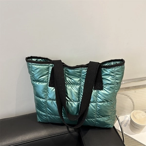 Quilted metallic green space cotton tote bag with black strap handles for women