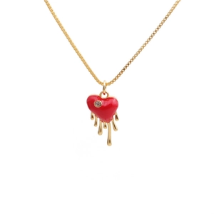 Golden box chain necklace with red melting heart pendant and sparkling zircon stone