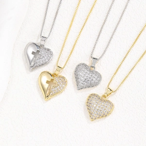 Collana con ciondolo a cuore e croce con zirconi micro-incastonati in oro e argento
