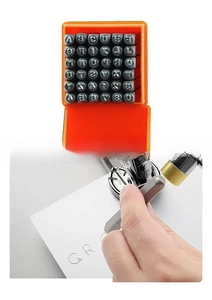 Detailed view of 36pcs metal stamps being used for DIY leather and jewelry embossing