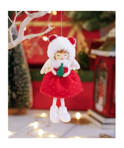 Close-up of red and white plush Christmas angel girl doll with a green tree detail