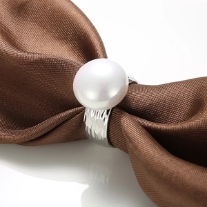 Baroque stainless steel ring with white pearl and hammered texture on brown silk