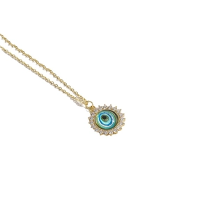 Golden Evil Eye choker necklace with resin pendant and zircon crystals for women