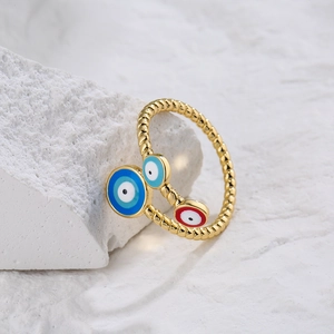 Adjustable golden twisted evil eye ring with blue and red enamel charm details