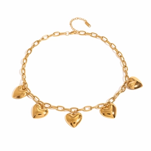 Golden stainless steel chain necklace with five polished heart pendants on white background