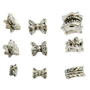 Tibetan silver lotus bead caps and vintage animal charms for DIY jewelry making