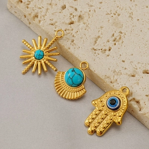 Gold stainless steel pendants with turquoise sun, fan and Hamsa Hand charms