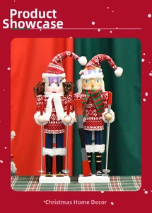 Close-up of a pair of wooden Christmas nutcracker soldiers wearing red ski gear and goggles