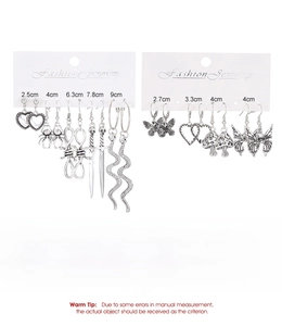 Detailed specs for gothic earrings set featuring heart, snake, sword and mushroom charms