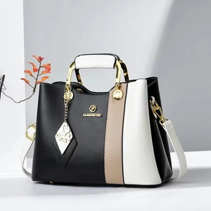 Three-tone color block tote bag with gold handles and adjustable shoulder strap for women
