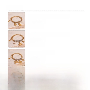 Detail view of titanium steel bracelets with imitation pearls and seashell charms