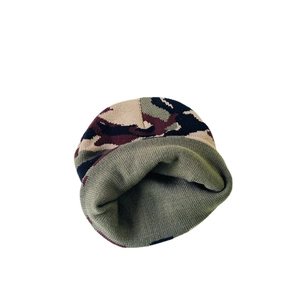 Knitted camo winter hat for kids featuring green and red camouflage pattern and warm lining