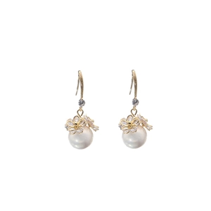 Elegant gold flower pearl earrings featuring sparkling zircons and baroque white pearls