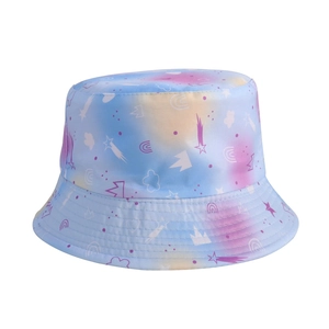 Detail of a kids sun hat featuring colorful star and rainbow pattern on gradient fabric