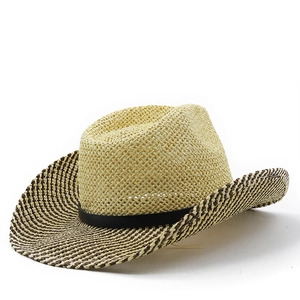 Beige wide brim raffia straw hat with brown polka dot texture and black leather band