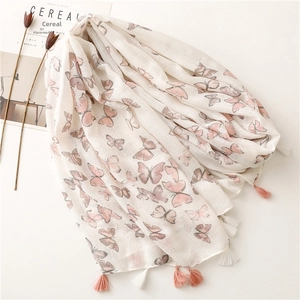 Off-white cotton linen scarf with pink butterfly print and decorative tassels