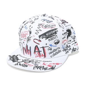 White flat brim baseball cap featuring vibrant street art graffiti and bold red WHAT text