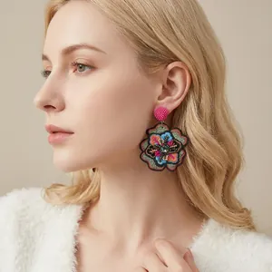 Bohemian large embroidered flower earrings with colorful beads and ethnic woven design
