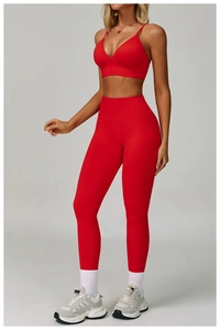 Close-up of bright red seamless high-waisted yoga pants and V-neck sports bra set