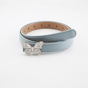 Y2K millennium style light blue belt with a silver butterfly buckle on white background