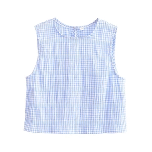 Detail of blue and white plaid sleeveless top with cotton-linen texture and round neck