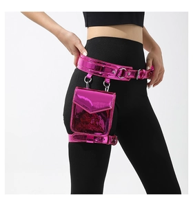 Detail of pink metallic waist and leg bag set showing the adjustable straps on model