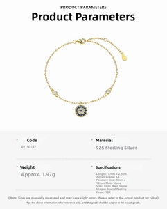 Detail of 925 sterling silver chain with 18k gold plating and zircon Evil Eye pendant
