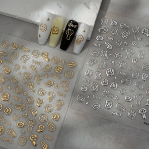 Gold and silver 3D metallic melting smiley face nail art stickers with stars and text